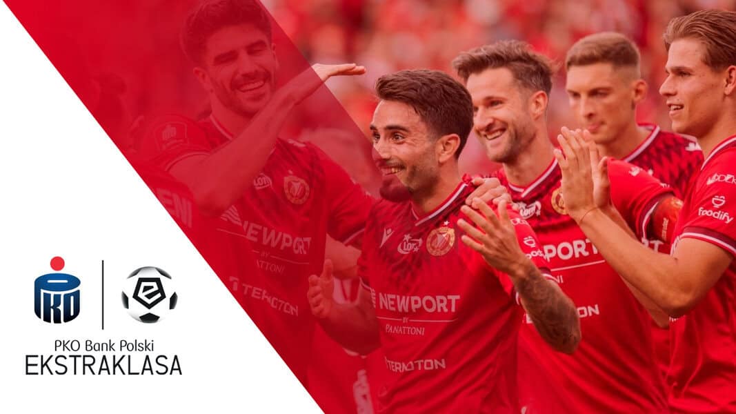 Soccer players in red jerseys celebrate a goal; the PKO BP Ekstraklasa logo and scoring charts are visible on the left