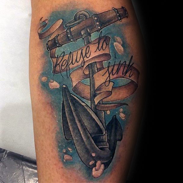 Refuse to Sink" anchors tattooed boldly on skin