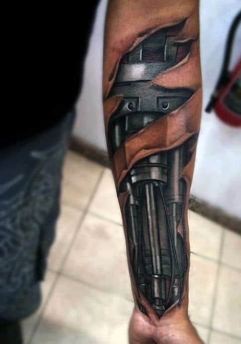 Forearm tattoo with a mechanical design beneath torn skin effect