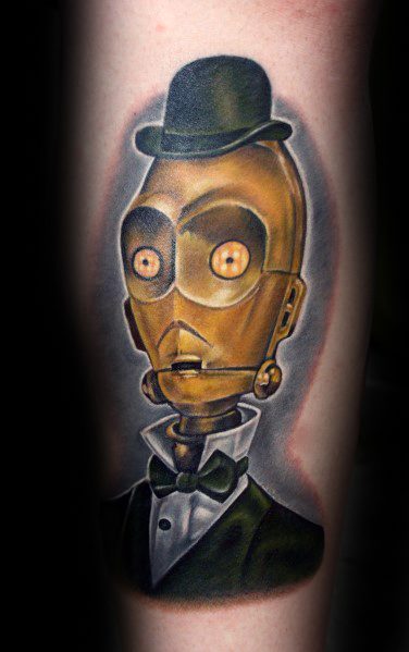 Gentleman-style C-3PO tattoo with a bowler hat and tuxedo, blending steampunk and sci-fi elements in a realistic design.