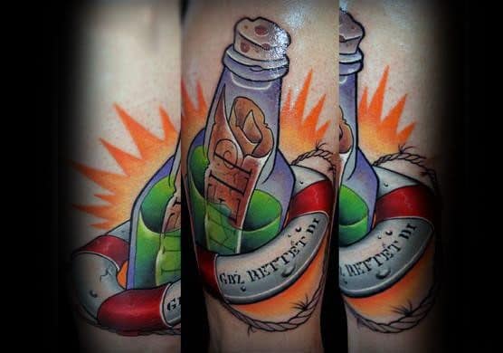 Colorful tattoo of a message in a bottle with a cork, surrounded by a lifebuoy and vibrant bursts.