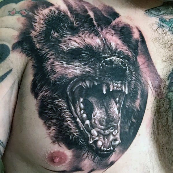 Hyper-realistic hyena tattoo on the chest with intense shading, detailed fur texture, and a wide open mouth showing sharp teeth in a fierce snarl.