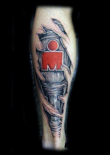 Tattoo design showcasing the iconic Ironman logo breaking through the skin, symbolizing resilience and the challenging nature of the race.