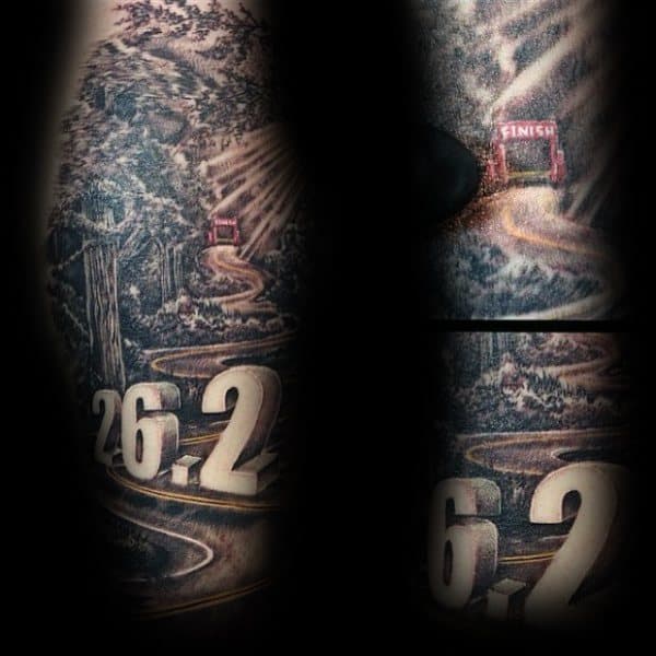 Winding forest road leading to a red finish line with bold 26.2 text in the foreground, symbolizing a marathon journey.