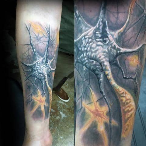 Realistic neuron tattoo on forearm with detailed axons and dendrites, featuring glowing orange synapse-like highlights.