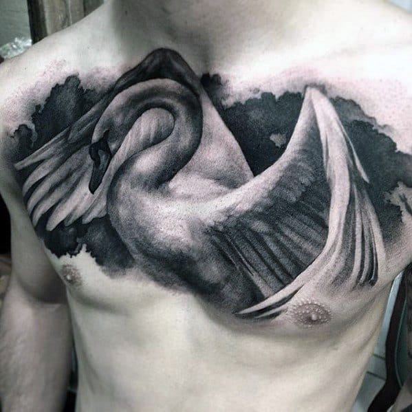 Chest tattoo of a swan with wings spread across the chest, set against a dark cloud backdrop for a bold and dramatic look.