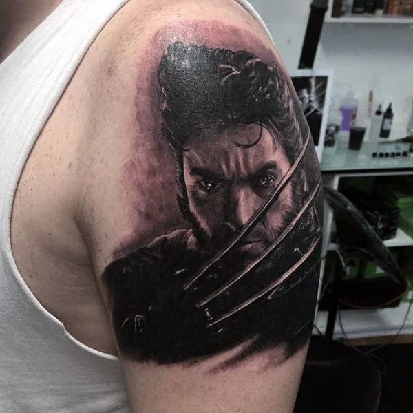3d Realistic Wolverine Tattoo With Hames Howlett On Mans Upper Arm
