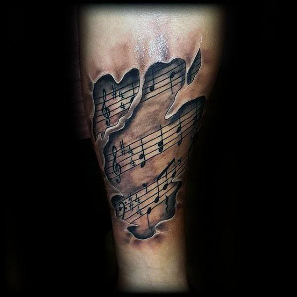 3d Ripped Skin Music Staff Tattoo Design On Mans Forearm