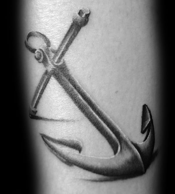 Realistic black and gray anchor tattoo with detailed shading, creating a three-dimensional effect, symbolizing strength, stability, and resilience.