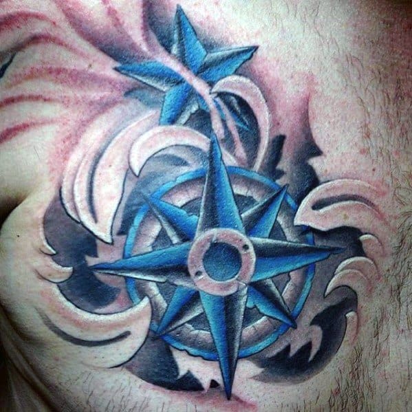 Bold 3D blue star and compass tattoo with swirling abstract elements, creating a dynamic and layered chest design.
