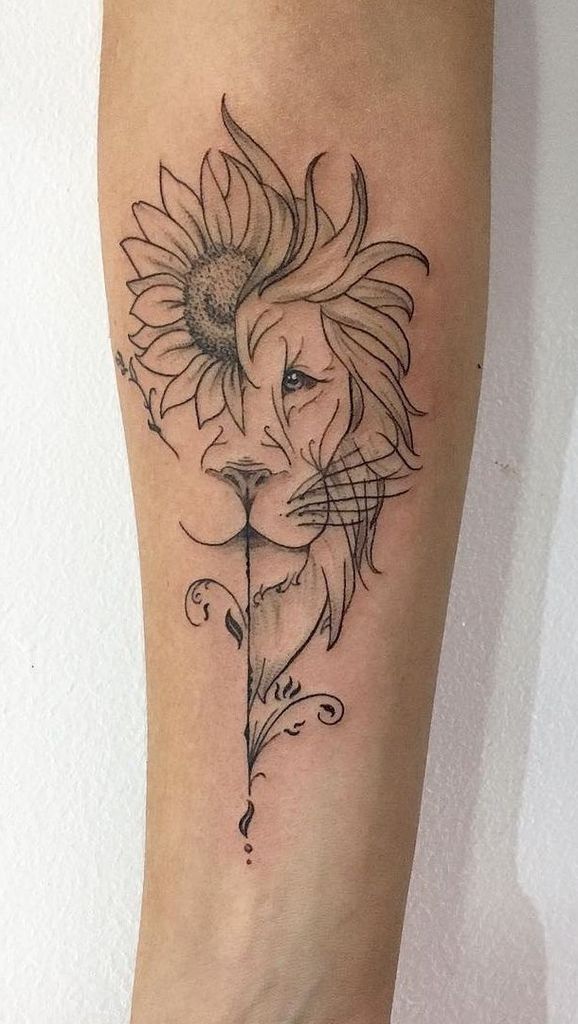 Unique black ink tattoo on forearm blending a sunflower with a lion's face, featuring fine line details and a flowing artistic design.
