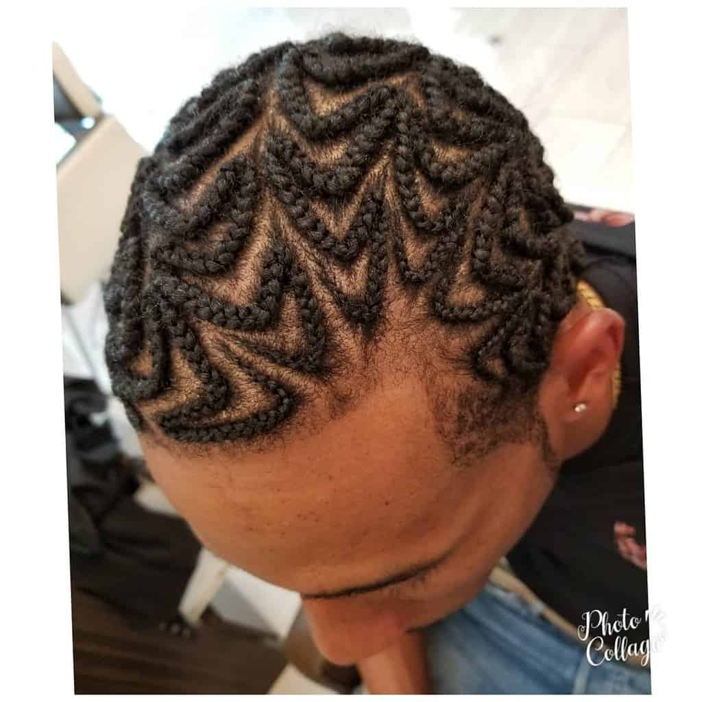 A Black Man Wearing Angled Cornrows