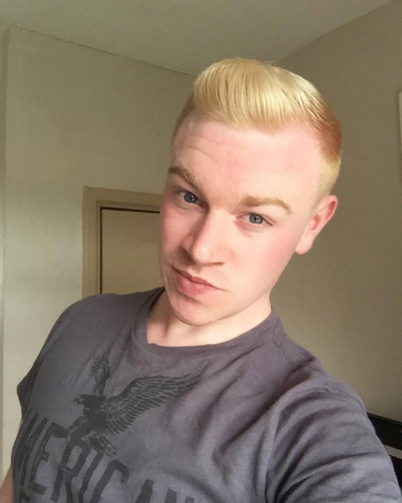 A Blond Quiff Cut Featuring Long And Raised Hair In The Front And Shaved Sides