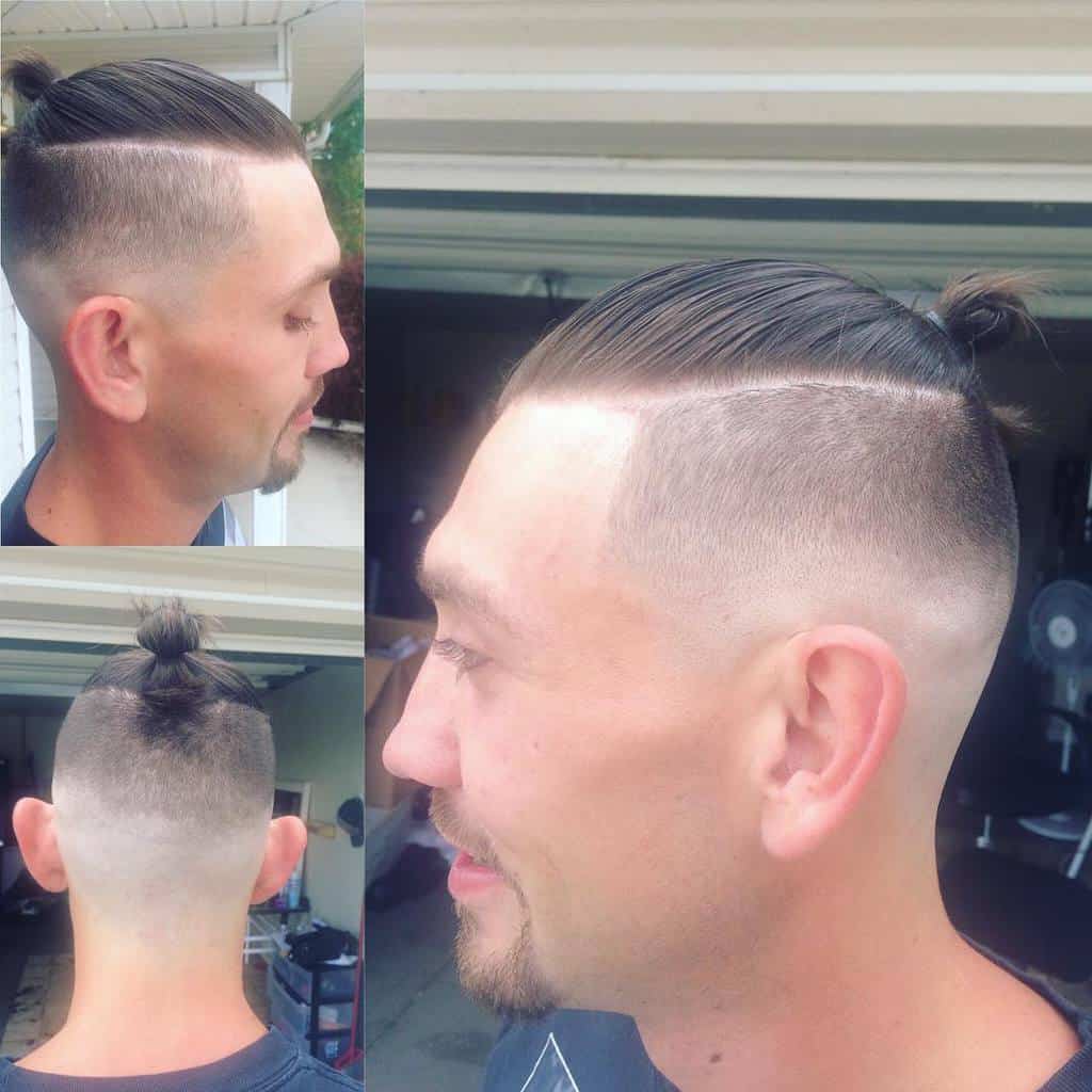 A Classic Man Bun Style Paired With A High Fade