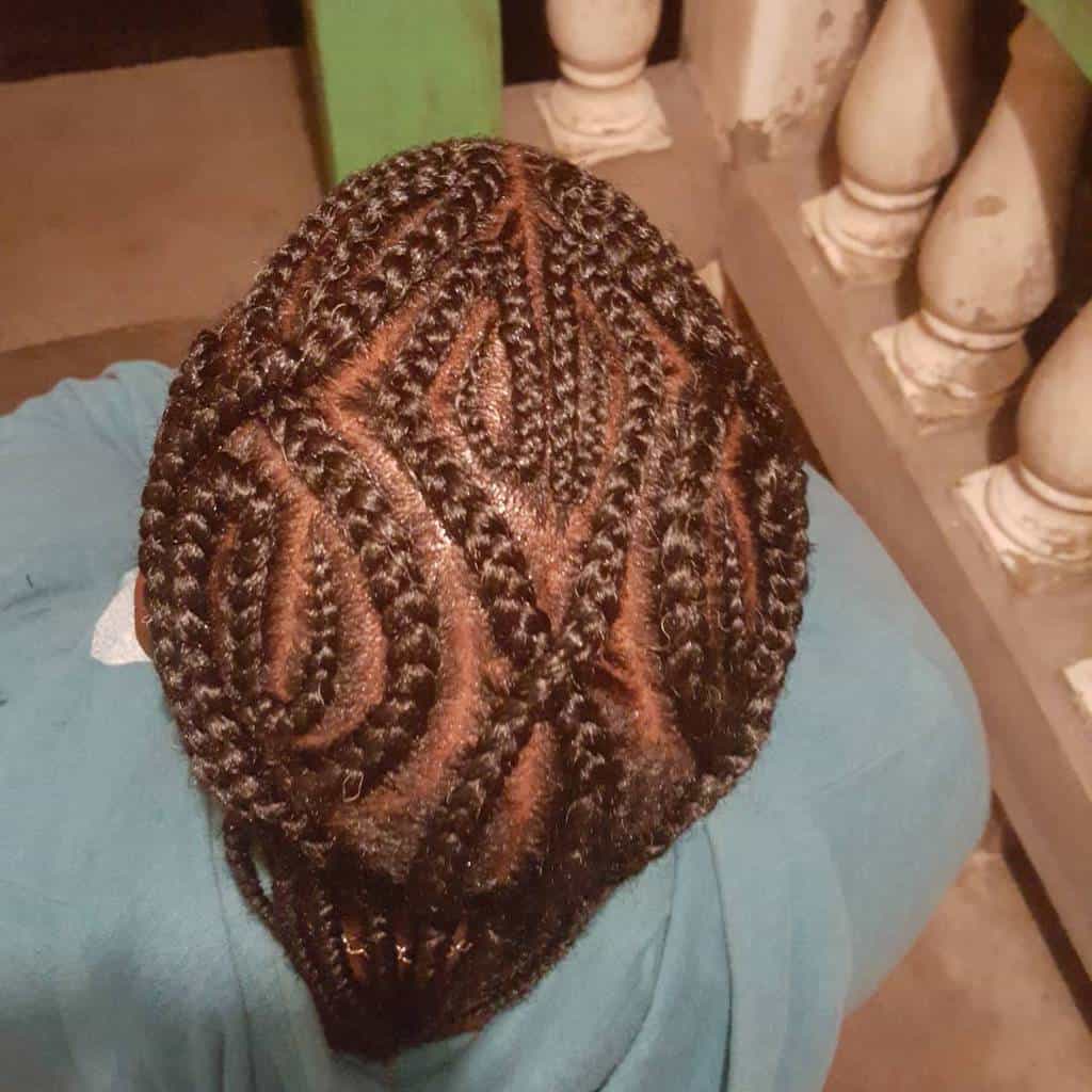 A Guy Wearing Diamond Shaped Cornrows. Great Artistry To Relish