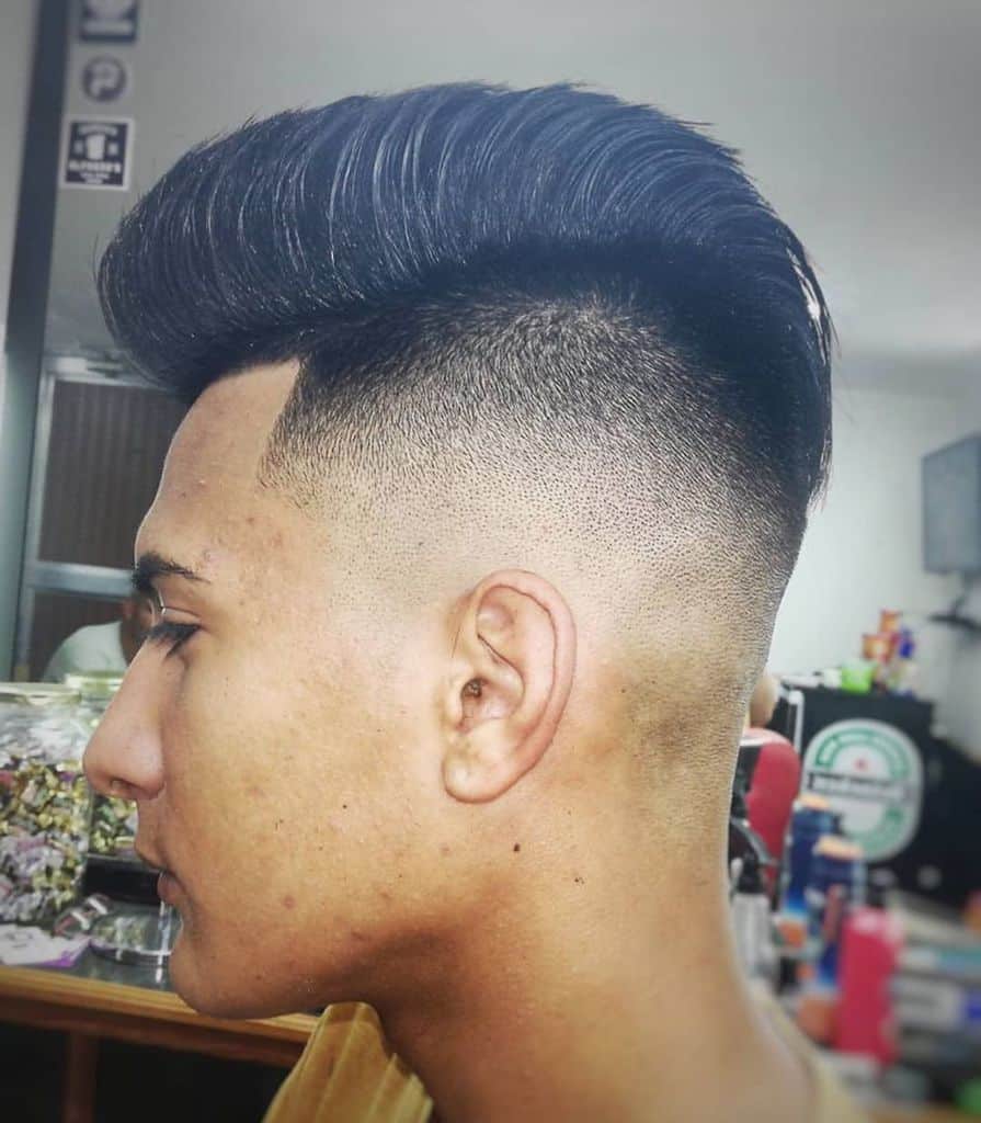 A Hi Top Cut Paired With A Disconnected Undercut And Sharp Fade