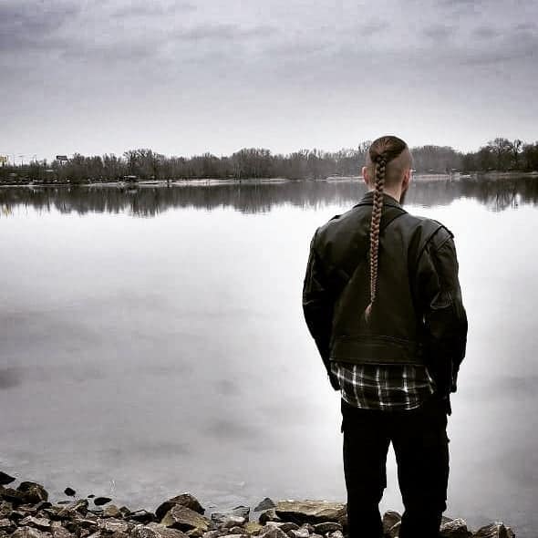 A Long Viking Braid Paired With An Undercut