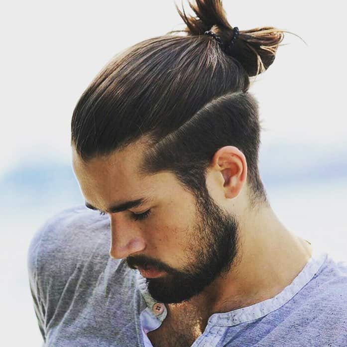 A Slick And Polished Man Bun Undercut Style For Professionals