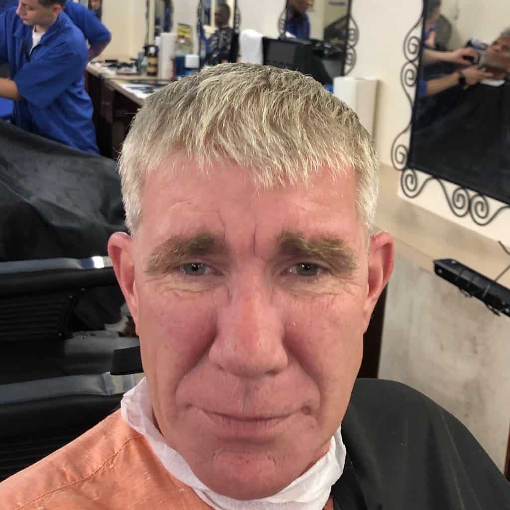 A Traditional Caesar Cut With Clipped Sides And Back