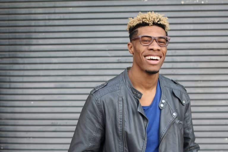 African American Man With Glasses and Blond Highlights