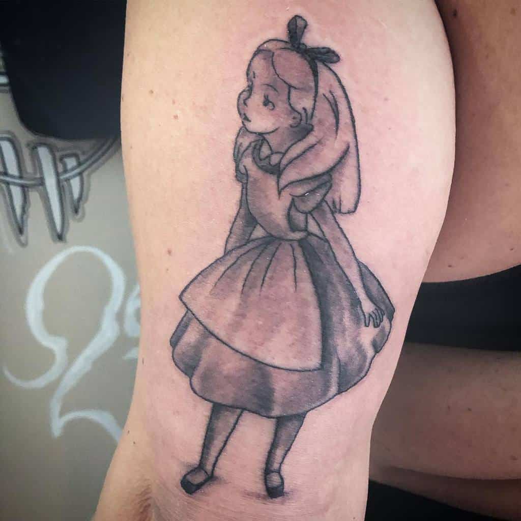 Black and white tattoo of a simple, sketch-like Alice from Alice in Wonderland, wearing her iconic dress and bow