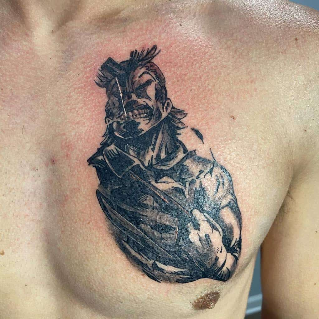 Black and grey tattoo of All Might from My Hero Academia in his weakened form, featuring intense shading and a gritty expression