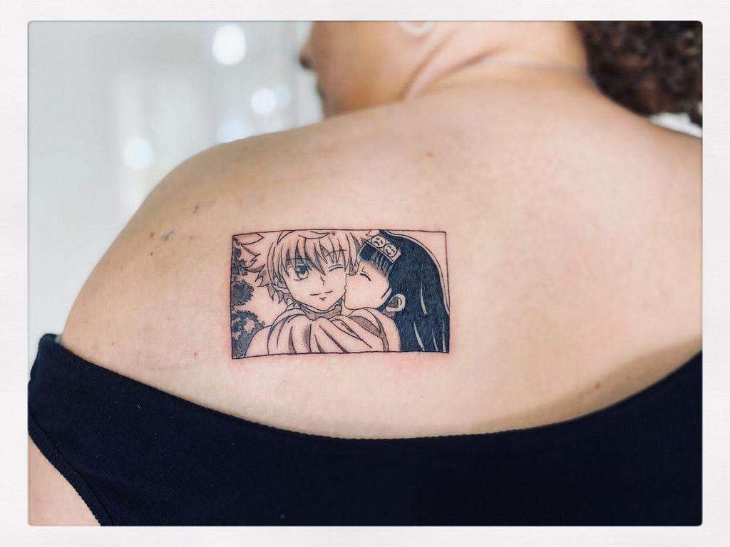 Minimalistic tattoo of Alluka Zoldyck hugging Killua from Hunter x Hunter, showcasing their bond in a rectangular frame design