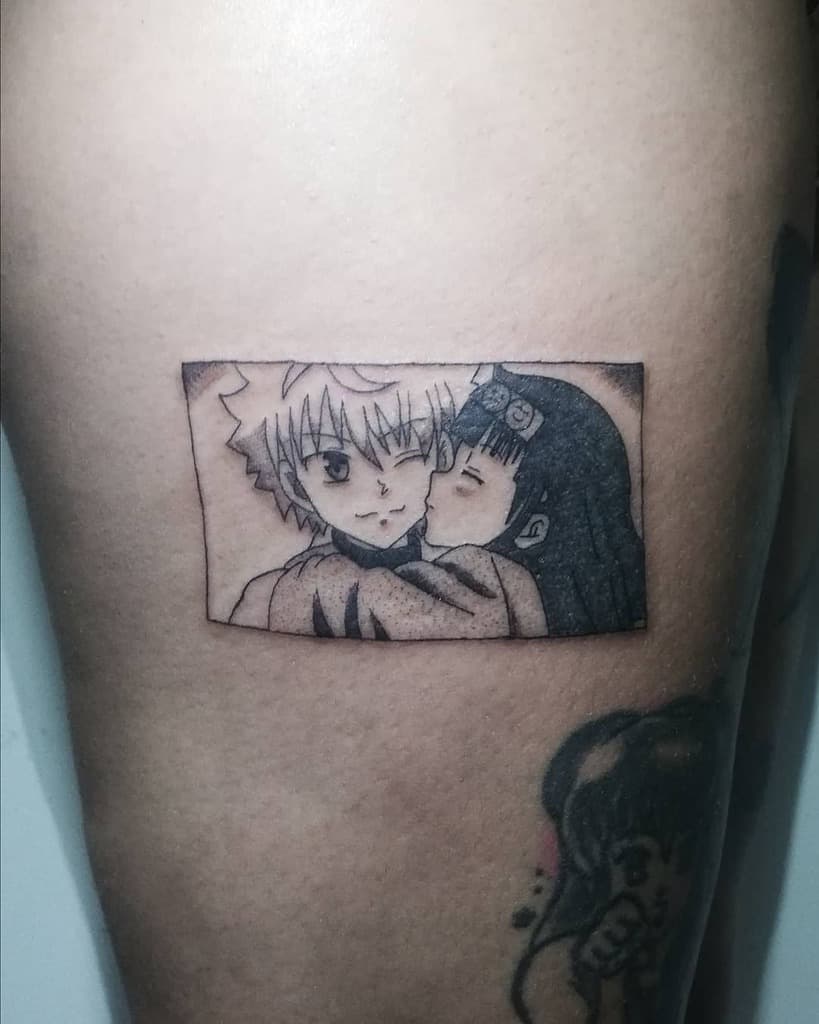 Detailed tattoo of Killua and Alluka Zoldyck from Hunter x Hunter, depicting a tender sibling moment within a framed design