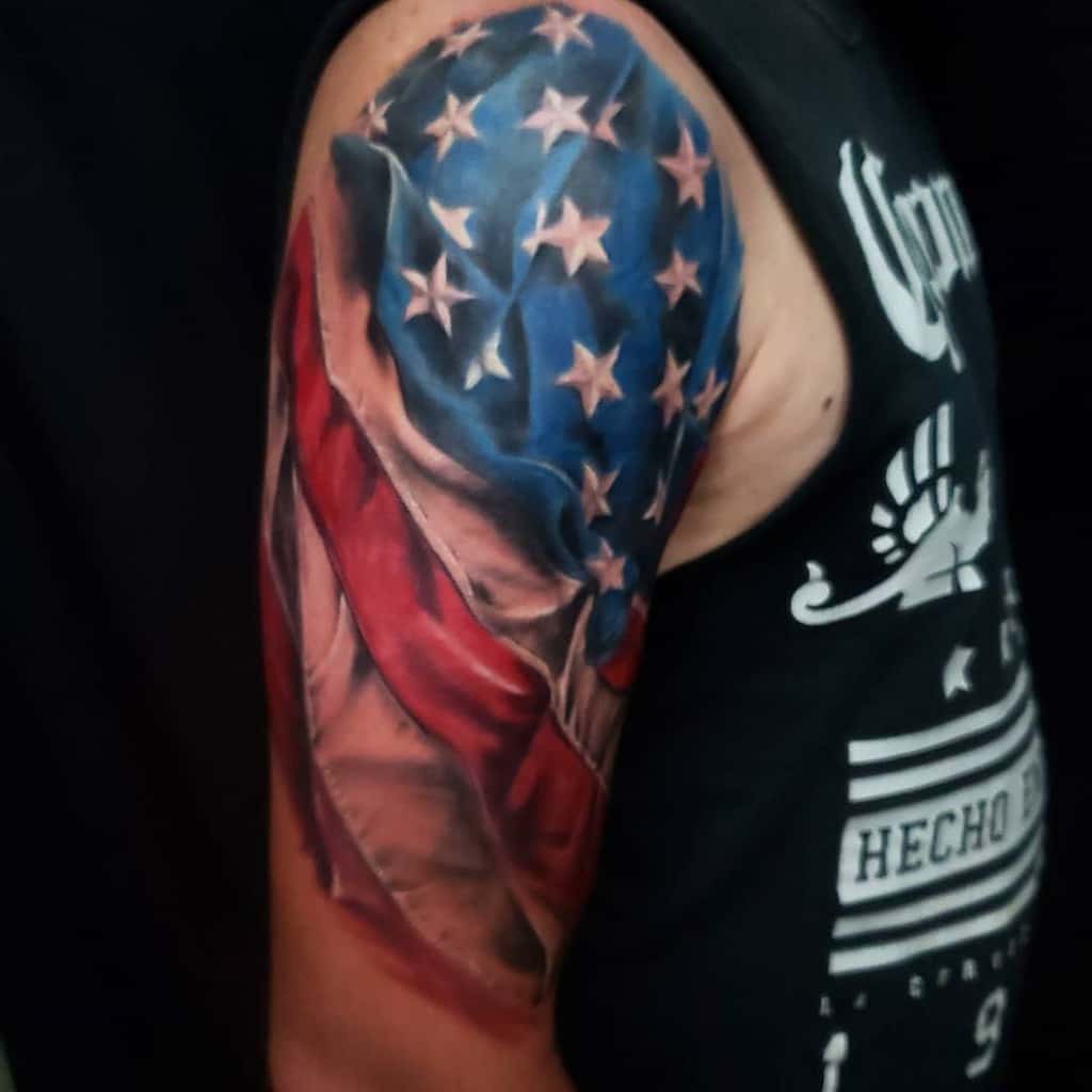 Tattoo of the American flag on an upper arm