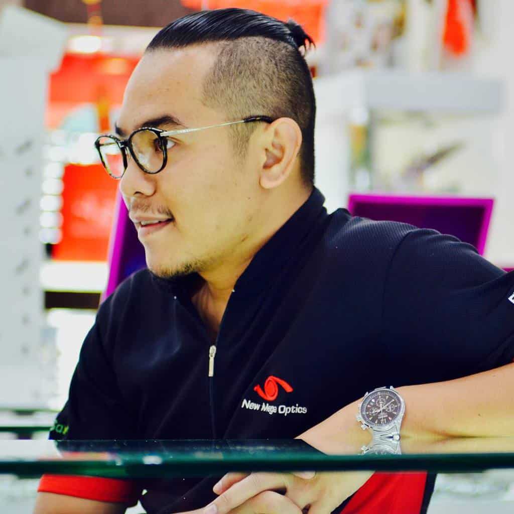 An Intense Man Bun Disconnected Undercut Paired With Shave Sides