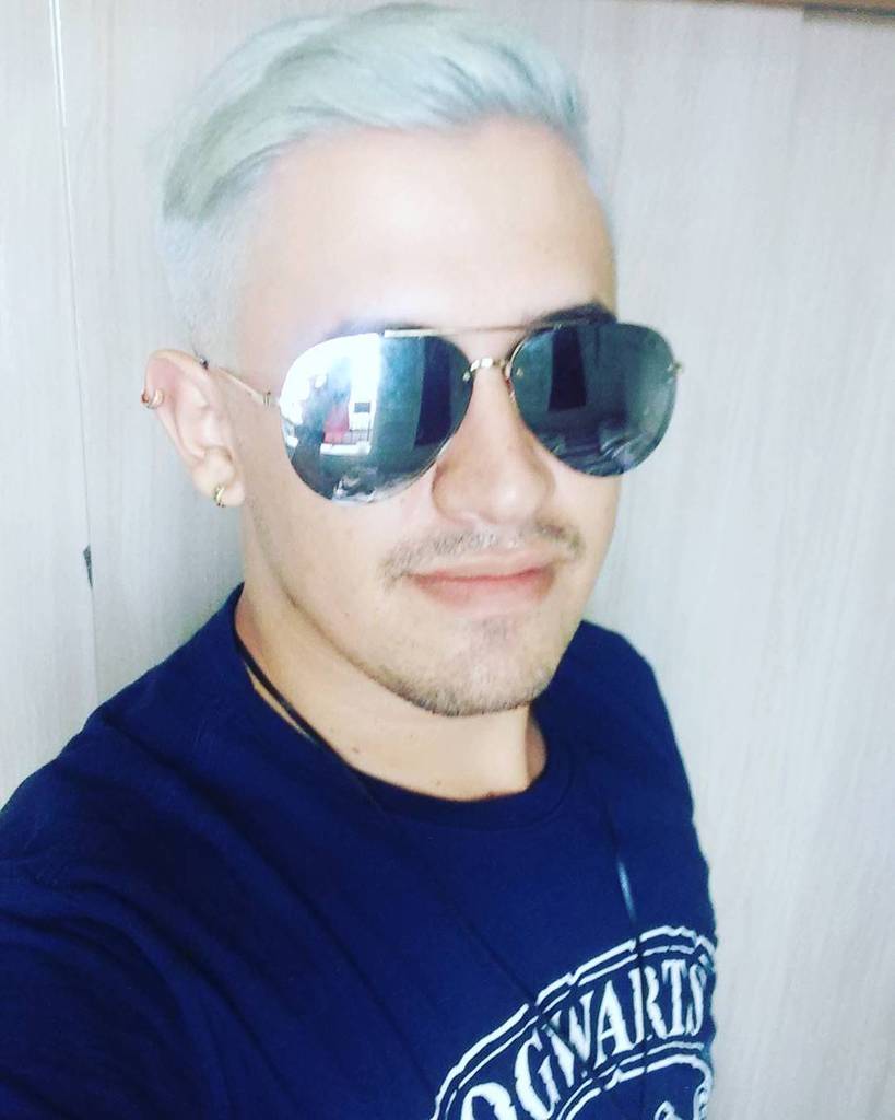 An Undercut Hairstyle For Guys With Gray Hair. The Haircut Is Quite Versatile