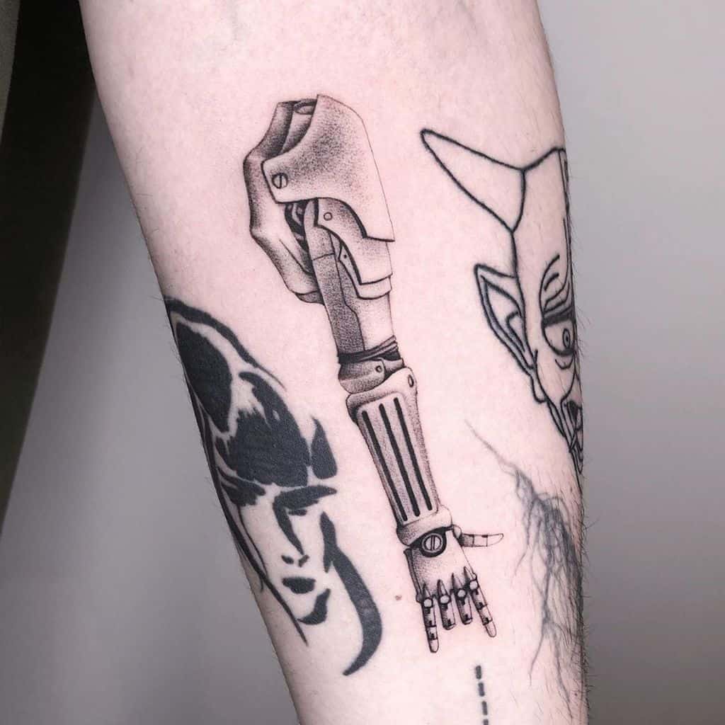 Black and grey tattoo of Edward Elric’s automail arm from Fullmetal Alchemist, detailed with shading and mechanical precision