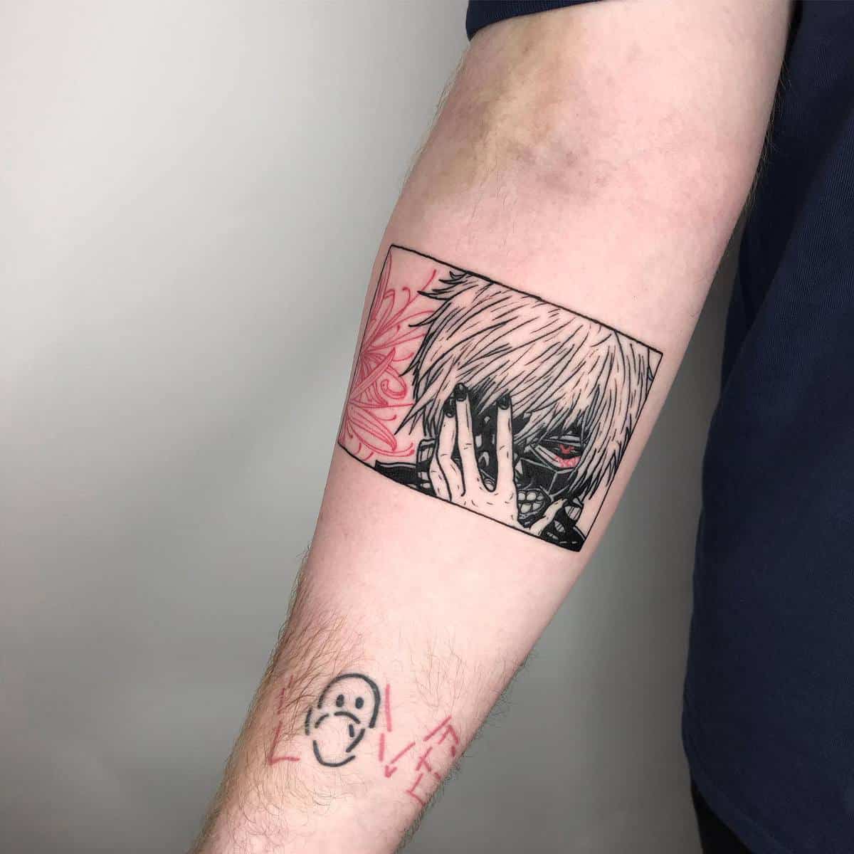 Forearm tattoo of Kaneki Ken from Tokyo Ghoul, showcasing his masked face with red accents