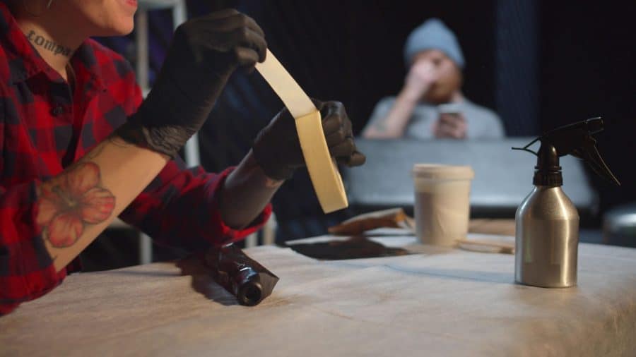 Applying Tattoo Bandage