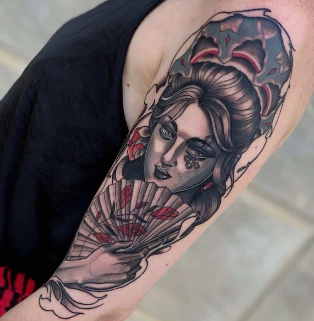 Art Nouveau-style tattoo of a mysterious woman with an elaborate updo, holding a decorated fan, with intricate ornamental and red accents