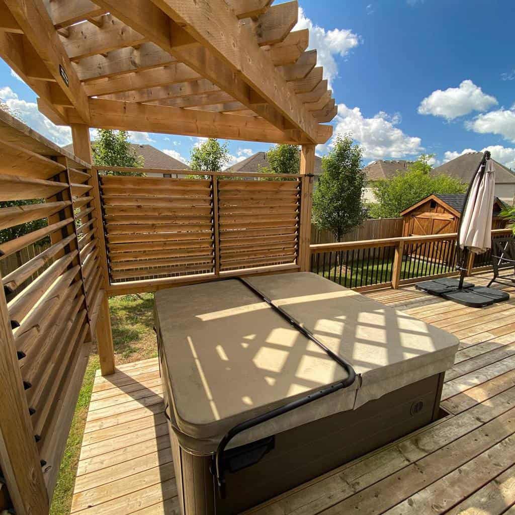 simple backyard wood deck covered spa