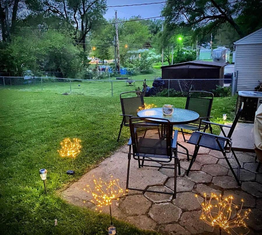 backyard patio with black table and chair set