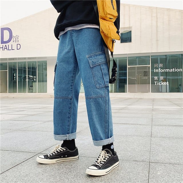 Cuffing baggy jeans is a great way to bring more dimension to an outfit
