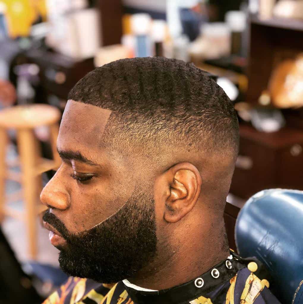 Bald Fades for Men With Wavy Hair stone_da_barber