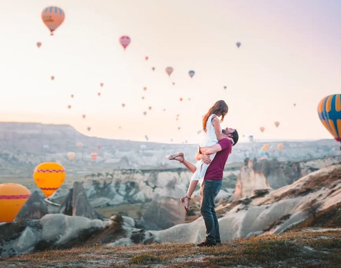 Man Lifting Up Woman