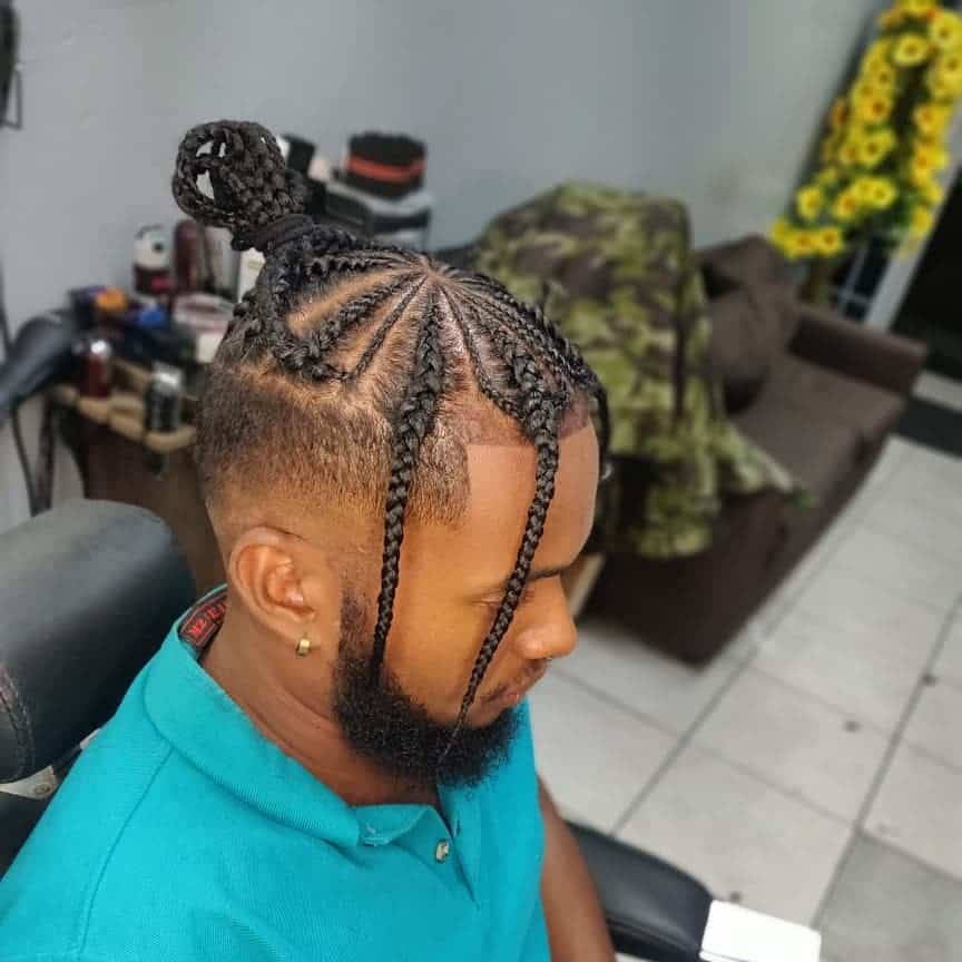 Beautiful Cornrows Styled On Top Of The Head And Paired With An Undercut And Braid Bangs