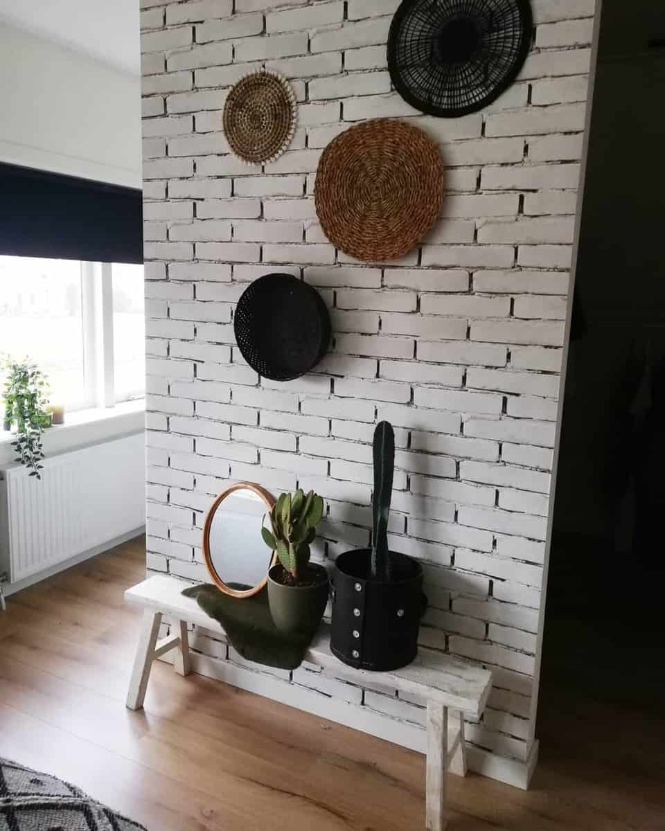white brick bedroom wall with cactus