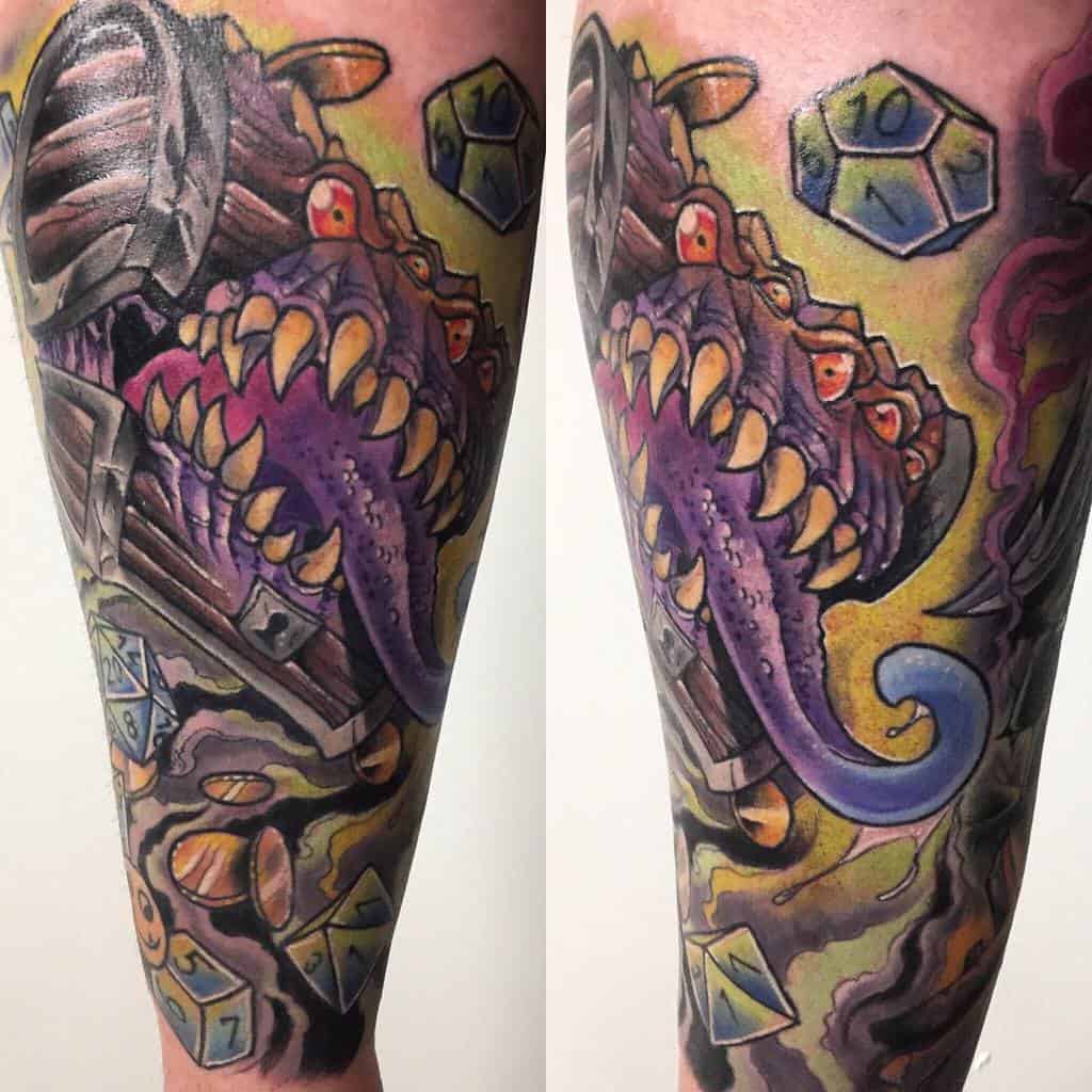 Colorful Dungeons & Dragons tattoo featuring a Mimic with a purple tongue, sharp teeth, glowing dice, and vibrant background details