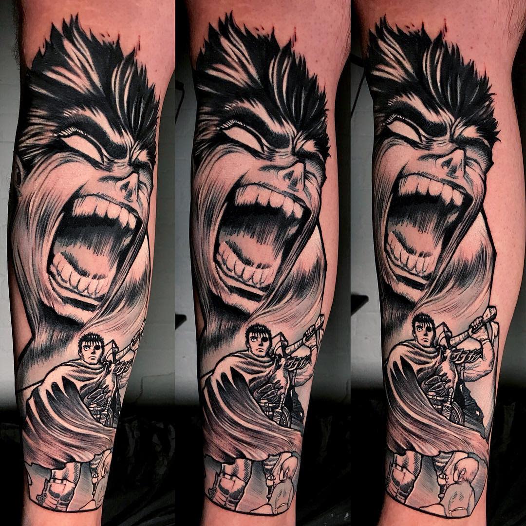 Dynamic tattoo of Guts from Berserk on the forearm, showcasing a large, intense expression of him roaring above a smaller, full-body depiction of Guts in battle stance with his sword drawn