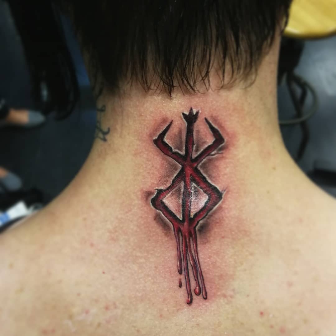 Tattoo of the Brand of Sacrifice from Berserk on the back of the neck, depicted in dark red and black ink with a dripping, bleeding effect