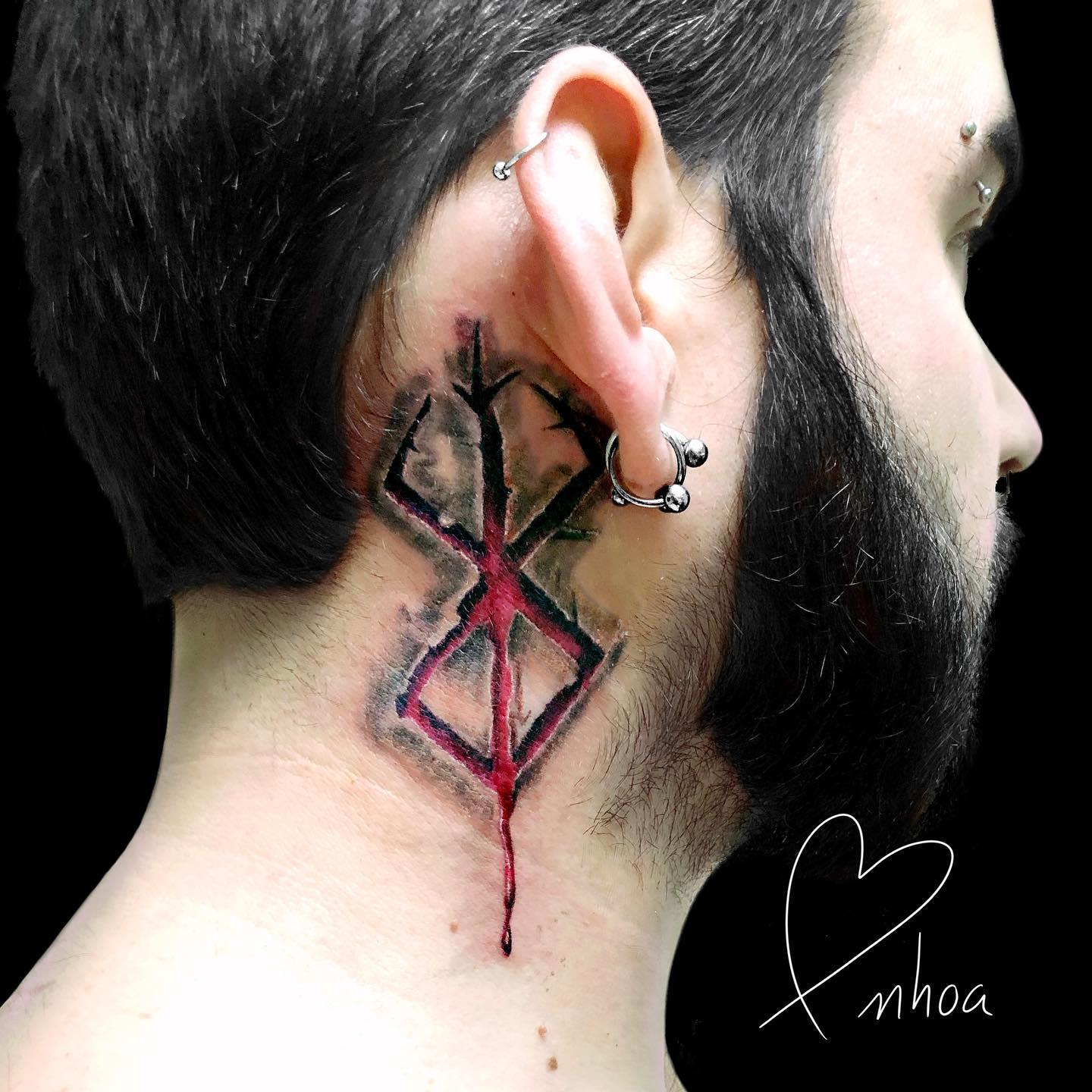 Tattoo of the Brand of Sacrifice from Berserk on the side of the neck, depicted in dark red and black ink with a bleeding, dripping effect
