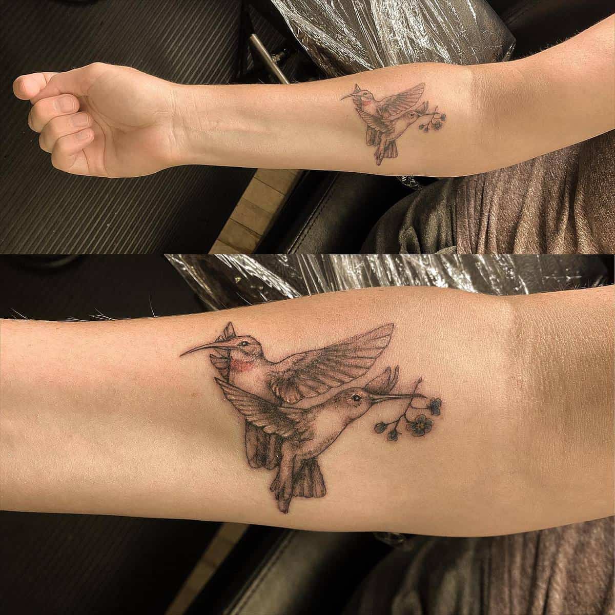 Forearm tattoo of two hummingbirds in flight, one holding a twig with small berries with detailed shading