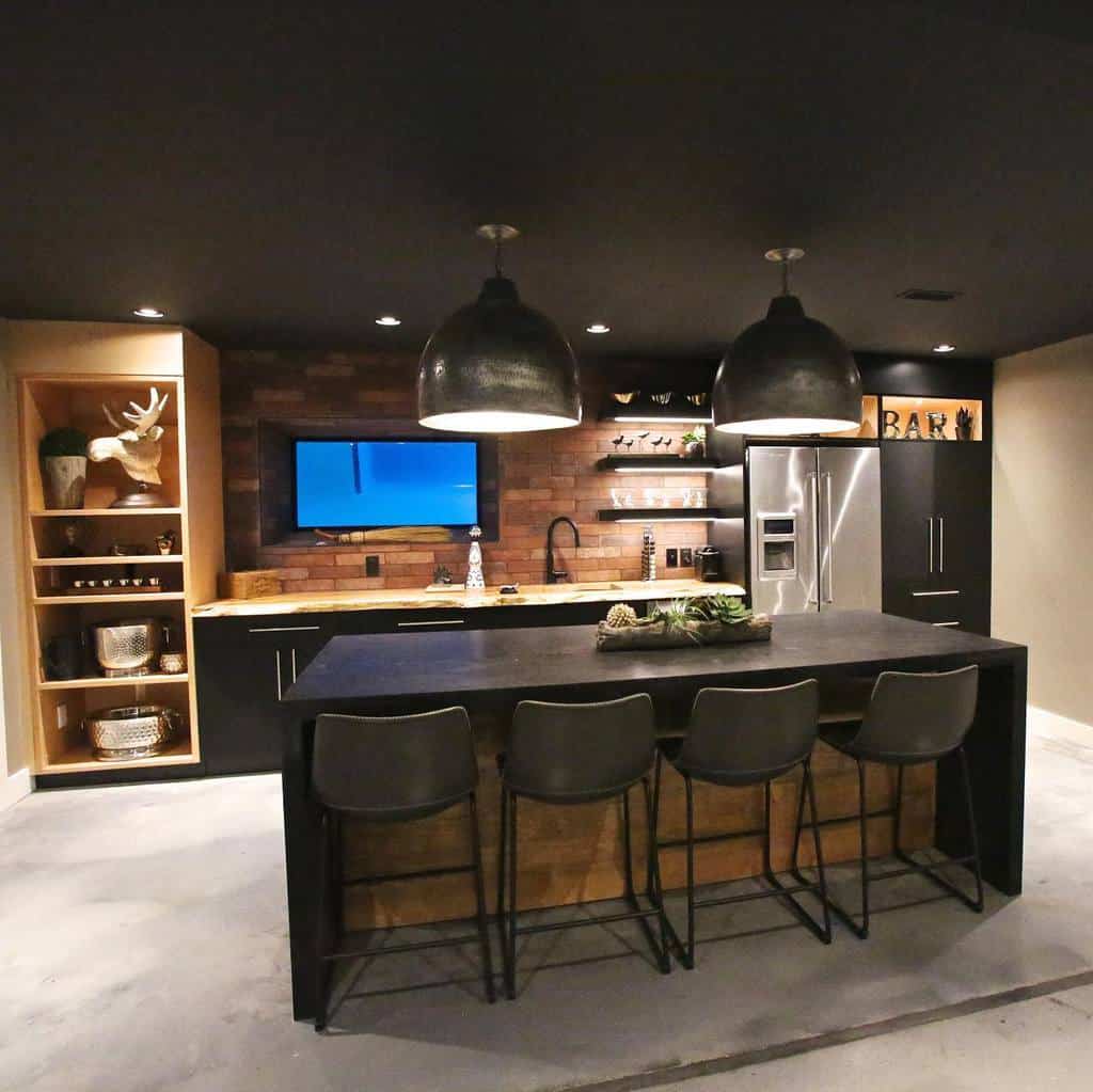 Modern black basement bar with wooden accents, open shelving, and industrial pendant lights.