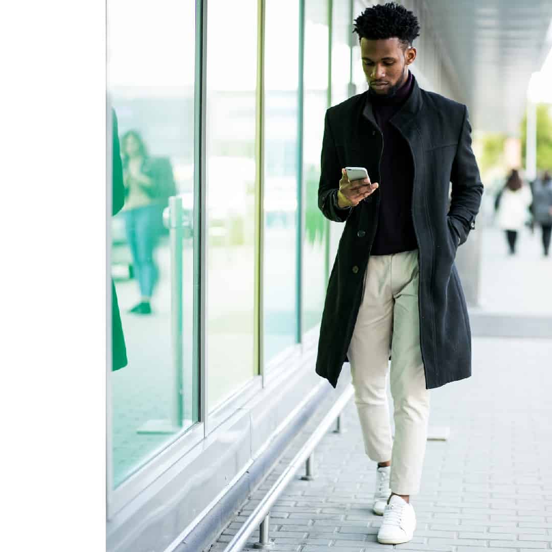 African,American,Man,Ysing,Phone