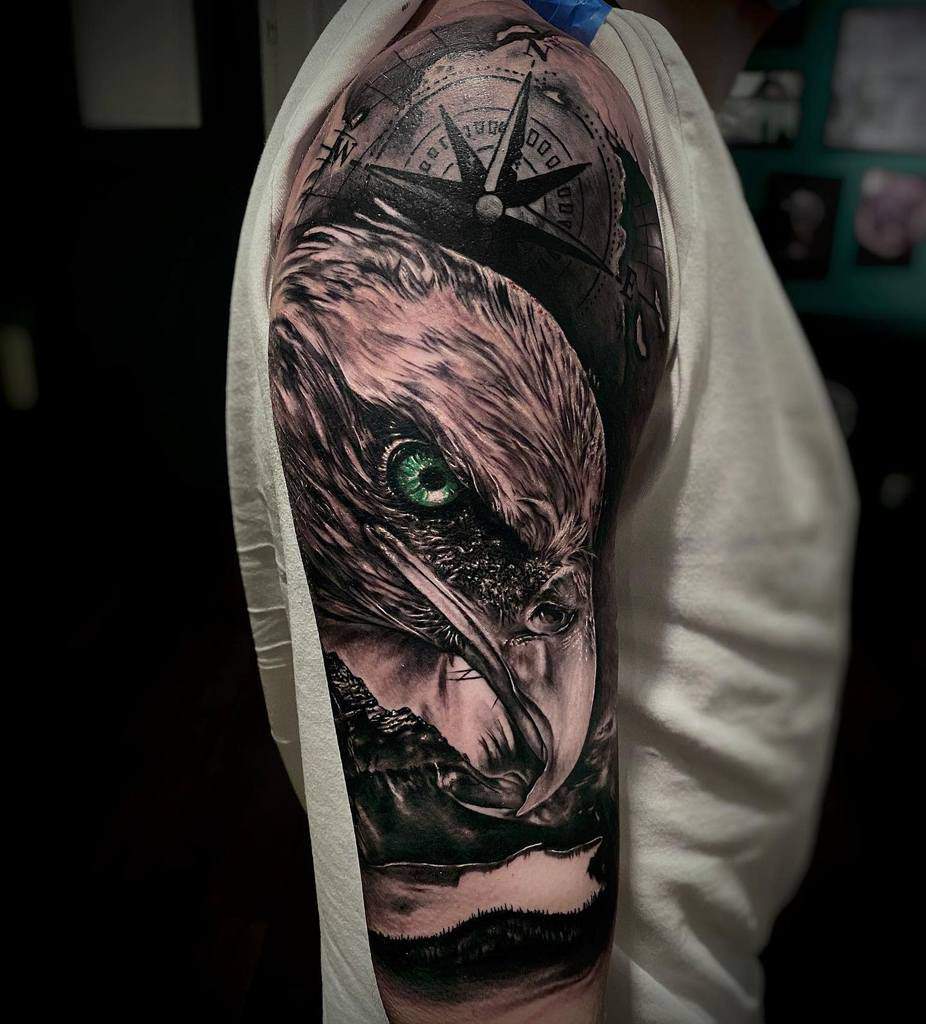 Detailed eagle head tattoo sleeve, showcasing intricate shading and realistic features